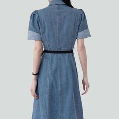 Introducing the 2023 Spring-Summer Collection's A-line Buttoned Elongated Denim Dress ââ‚?channeling the best of 90s grunge style in a vogue silhouette!Why It's A Must-HaveThis timeless denim dress is the perfect blend of vintage and modern; it's a enduring wardrobe staple that will never go out of flair. The A-line shape and buttoned closure add a sense of sophistication. while the stonewashed finish provides a unique edge. Whether you're heading to a summer soiree or a casual gathering with fr Spring Short Sleeve Belted Denim Dress, Cotton Midi Denim Dress With Button Closure, Cotton Denim Midi Dress With Button Closure, Non-stretch Cotton Denim Dress With Buttons, Elegant Ribbed Collar Top, Spring A-line Denim Dress With Pockets, Summer Short Sleeve Belted Denim Dress, Summer Denim Dress With Belt And Short Sleeves, Casual Short Sleeve Belted Denim Dress