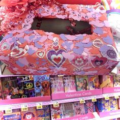 valentine's day boxes are on display in a store