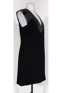 This shift dress is instantly elevated with a mirror and silver embroidery design at the shoulders. The perfect cocktail dress for a dinner date, pair it with silver pumps to complement. Size S 77% triacetate, 23% polyester Concealed back zipper Lined interior Geometric mirror embellishment at shoulders Silver embroidered design at shoulders Shift silhouette Above knee Bust 34" Shoulder to hem 34" Embellished Sheath Mini Dress For Formal Occasions, Formal Embellished Sheath Mini Dress, Geometric Mirror, Max Dress, Perfect Cocktail Dress, Silver Embroidery, Silver Pumps, Bcbg Max Azria, Max Azria