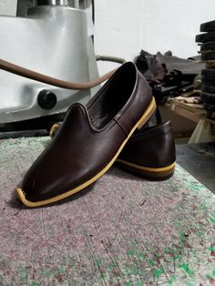 These are genuine leather, handmade men's shoes. Very useful soft shoes. Made with naturel leather and naturel dyed. There are many diffirent color options.  Every size is available, 5 us men's to 13.5 us men's, 37 eu men's to 50 eu men's. #loafermen #leathermenflats #medievalsandals #oxfordshoes #mengift Brown Leather Loafers With Soft Sole, Artisan Brown Slip-on Moccasins, Traditional Leather Sole Slip-on Loafers, Traditional Brown Round Toe Slip-ons, Traditional Brown Moccasins With Round Toe, Traditional Brown Leather Slip-on Shoes, Traditional Leather Loafers, Traditional Plain Toe Leather Shoes, Traditional Brown Leather Shoes With Rubber Sole