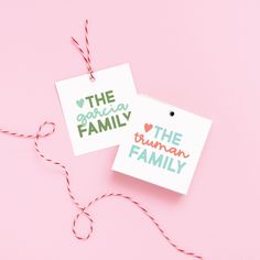 two tags with the words the crazy family and the funny family on them hanging from twine