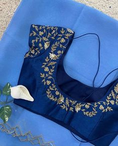 Hand embroidered ready made saree blouse with saree /blue crop top/stitched saree blouse usa /orgajza  saree blouse/modern blouse/zardosi blouse/blue organza saree blouse/ pure silk blouse/ silk saree with maggam work blouse        It is very true that a perfect blouse is the one which makes your saree look stand out !! If you find one of such a style that you have been wanting to have then dont let it go !! we carry such unique trending blouses that instantly add a stylish look to any saree !!     Well..!! we understand that you may not get in your desired size/pattern, here you go with customization according to your size/pattern which we can deliver in 1-2 weeks of time period !!      Here is a beautiful Hand embroidered zardosi work saree  in ice blue color that has golden shade cutwor Blouse For Blue Saree, Golden Color Blouse Designs, Saree Blouse Modern, Blouse Organza Saree, Bottle Green Blouse, Zardosi Blouse, Embroidery Blouse Saree, Hand Embroidery Blouse, Blouse Organza