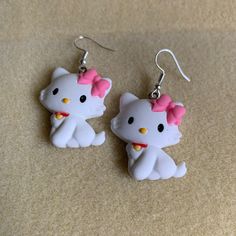 - Adorable Earrings Featuring Hello Kitty - Handmade (By Myself) And Packaged With An Earring Card, Wrapped In A Cellophane Bagperfect For Gifts! - Charms Are Made Of Resin, Size Is 1.7 X 3.5cm - These Are Pretty Lightweight - On Silver Fishhook Earring Hooks Check Out My Closet For More Handmade Jewelry And Other Characters, Including Sanrio Characters Tags: Animal, Forest, Cottagecore, Fairytale, Bear, Teddy Bear, Bow Tie, Kawaii, Hello Kitty, Sanrio, My Melody, Kuromi **Add 3 Jewelry Items Ma White Novelty Jewelry With Cute Design, Cute White Hello Kitty Jewelry, White Cat Design Jewelry With Cat Ears, Cute White Jewelry With Cat Design, Cute White Cat Ears Jewelry, Cute White Cat Design Jewelry, White Cat Design Earrings, Hello Kitty Stud Earrings, Novelty White Cat Design Jewelry