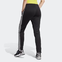 Does the woman in your life stay fit? Does the woman in your family like to lounge around the house in comfortable clothing? With the adidas Superstar womens track pants, the woman on the go and go better, and the woman who simply wants to be comfortable will feel great in her new adidas track pants. Slim fit. Drawcord on elastic waist. Front zip pockets provide storage. Made with Primeblue, a high-performance recycled material. Adidas Superstar Women, Adidas Adicolor, Pants Adidas, Track Pants Women, Adidas Track Pants, Adidas Track, Track Pant, Women Lifestyle, Tracksuit Bottoms