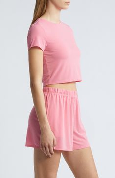 Cut from a lightweight, lightweight fabric with a softly ribbed texture, this cropped T-shirt takes your lounge game to the next level of comfort. 16 1/2" length (size Medium) Crewneck Short sleeves 59% polyester, 32% viscose, 9% spandex Machine wash, tumble dry Imported Casual Cropped Seamless T-shirt, Cropped Short Sleeve T-shirt For Summer Loungewear, Basic Stretch Cropped T-shirt For Loungewear, Seamless Crew Neck T-shirt For Loungewear, Trendy Cropped T-shirt For Loungewear, Casual Ribbed Cropped Cotton T-shirt, Basic Cropped T-shirt For Loungewear, Athleisure Crop Top T-shirt For Loungewear, Summer Athleisure Crop Top With Crew Neck