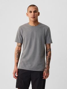 Soft cotton jersey T-shirt.  Crewneck.  Short sleeves.  Standard fit.  Slim through the chest and shoulders.  Hits at the hip.  Colin in black, blue) is 6'2"/188cm with 32"/81cm waist and 32"/81cm inseam wearing regular Gap Gap Everyday Crew Neck T-shirt, Gap Casual Relaxed Fit T-shirt, Gap Summer T-shirt For Everyday Wear, Sporty Relaxed Fit Cotton Jersey T-shirt, Gray Fitted Crew Neck T-shirt, Gap Sporty Relaxed Fit Tops, Gap Tops For Summer Streetwear, Gap Summer Streetwear T-shirt, Sporty Cotton Tops By Gap