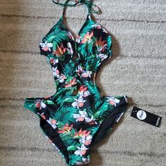 Boohoo Us Size 8 Swimsuit. Brand New With Tags, Still Has Protective Plastic Covering. Green Halter Neck Swimwear With Floral Print, Green Floral Print Halter Neck Swimwear, Green One-piece Swimwear With Floral Print, Green Floral One-piece Swimwear, Green Floral Print One-piece Swimwear, Casual Floral Print Halter Neck Swimwear, Bohemian One-piece Floral Print Swimwear, Bohemian One-piece Floral Swimwear, Boohoo Maternity