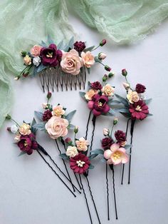 This set burgundy flower hair pins wedding , of artificial flowers This a beautiful and delicate hair accessory for brides and a nice gift to the bridesmaids   On the wedding day, every bride wants to look fantastic. This flower hair piece , will be a magical addition to your look on your happiest day.  This will emphasize the ease of your image.  The comb is very conveniently attached to the hair and fits in with any hairstyle.  -Material- artificial pearl and artificial greenery  -Colors-  burgundy, rust, green, white - Unique handmade.  Wedding - is one of the most important events in the life of any girl I am happy to try to make the most beautiful decoration for you, to make you feel the most beautiful bride. You deserve the best! Orange Burgundy Wedding, Burgundy Wedding Hair, Flower Hair Pins Wedding, Flower Hair Piece, Hair Pins Wedding, Flower Hair Pins, Floral Hair Pieces, Flower Hair Pieces, Jewel Tone Wedding