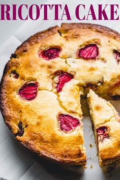 a close up of a pie on a plate with the words ricotta cake above it