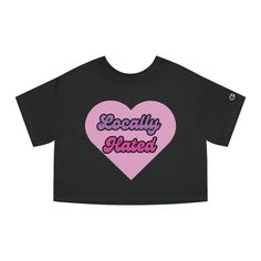 If you love Y2K inspired graphic tees try out our new "Locally Hated" graphic slogan tee! This is made of 100% cotton. Size down for a tighter fit like the OG 2000s girlies; Paris Hilton and Lindsay Lohan. We ship worldwide! Please keep in mind that shipping time varies on location. These graphic tees are a perfect gift for the person with a passion for fashion! .: 100% cotton jersey .: Medium fabric (7.0 oz /yd² (240 g/m .: Modern cropped fit .: Sewn-in label .: "C" logo on the left sleeve for Cotton Cropped T-shirt With Graphic Design For Streetwear, Slogan Cropped T-shirt With Relaxed Fit For Streetwear, Trendy Heart Graphic T-shirt For Streetwear, Y2k Cropped T-shirt With Text Print For Streetwear, Y2k Text Print Cropped T-shirt For Streetwear, Pop Culture Short Sleeve Top With Slogan, Graphic Tee Cropped T-shirt With Text Print For Streetwear, Graphic Tee Cropped T-shirt With Logo Print, Graphic Tee With Slogan For Fan Merchandise