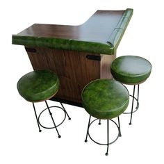 Mid-Century Solid Wood and Leather Décor Green Bar  Add a splash of vintage style to your home with this fantastic mid-century green bar! It features a bold green color that makes it a standout piece, perfect for any space looking to blend retro charm with modern elegance.  Design: Sleek mid-century modern lines with tapered legs Condition: Excellent; well-maintained Features: Ample storage for bottles and glassware  Dimensions:   This bar is ideal for entertaining or as a unique statement piece in your living area. Don’t miss out on the chance to own this eye-catching and functional piece of mid-century design.  Message me for more details or to arrange a viewing! 70s Bar Decor, Mid Century Bar Design, 50s Moodboard, 1920s Bar, Retro Home Bar, Modern Basement Bar, Mid Century Modern Bar, Reclaimed Wood Desk, Modern Basement