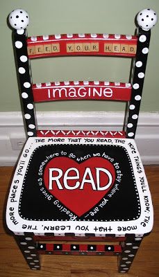 a chair made to look like a book with the word read on it and a heart