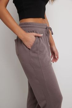 A part of our Simply Soft collection, this sporty-chic jogger is a charming choice to wear to work, weekend, and wherever else your life will carry you! These are a mid-rise fit, designed with a snug, elastic waistband and drawstring to adjust them to your desired comfort. You’ll fawn over these for many reasons, and their practicality may top that list: front and back pockets give you a little extra storage room for keys and other essentials. Their tapered leg is capped off with a soft self-cuf Bolero Cardigan, Bolero Dress, Fashion Joggers, Wear To Work, Loungewear Shorts, Storage Room, Sporty Chic, Slim Waist, Extra Storage