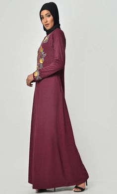 A perfect wardrobe piece for minimalistic style Round neck A stylish abaya with embroidered front and sleeves Includes both side pockets Full Sleeves FABRIC: Cotton Jersey CARE: Machine wash cold Long Sleeve Abaya With Modesty Panel For Fall, Casual Fall Abaya, Fall Long Sleeve Abaya With Modesty Panel, Eid Floral Embroidered Tunic Abaya, Fitted Long Sleeve Abaya With Dabka Work, Modest Floral Embroidered Abaya For Eid, Long Embroidered Dress With Floral Design For Eid, Long Embroidered Dress With Floral Embroidery For Eid, Long Floral Embroidered Dress For Eid