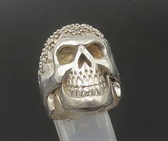 VERSANI 925 Silver - Vintage Shiny Skeleton Head Heavy Biker Ring Sz 9 - RG22374  Jewelry Type:         Ring  Metal Type:            925 Silver  Metal Size:             9 Finger  Stone Type:            N/A  Condition:              N/A  Jewelry Weight:     34 Grams  PLEASE NOTE: THIS ITEM IS PRE-OWNED. ALTHOUGH MOST ITEMS ARE IN VERY GOOD CONDITION, SOME MAY NEED CLEANING AND/OR MINOR REPAIRS. WE MAKE A VERY STRONG EFFORT TO UPLOAD CLEAR PICTURES. PLEASE INSPECT ALL PICTURES AND ASK ALL QUESTIONS YOU MAY HAVE PRIOR TO MAKING A PURCHASE. NOT ALL STONES ARE GENUINE, SOME ARE ENHANCED OR CREATED. Biker Style Sterling Silver Jewelry For Biker Events, Silver Skull Biker Jewelry, Biker Silver Skull Jewelry, Skeleton Head, Clear Pictures, Biker Rings, Ring Metal, Lovely Earrings, Turquoise Stone