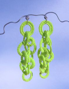 Discover the Fluo pendant earrings in neon green for the colour-blocking fanatic. They're lightweight and stylish, perfect attributes for choosing the perfect earring.

The authentic Fluo earrings are handmade with crocheted threads embellished with a sterling silver post.

They are a one-of-a-kind piece created according to the inspiration of the moment.

Colours may differ depending on your screen resolution. Handmade Neon Yellow Jewelry For Summer, Handmade Neon Jewelry For Summer, Bold Handmade Green Jewelry, Green Crochet Jewelry, Colorful Website, Colour Blocking, Textile Jewelry, Gift Card Sale, Pendant Earrings