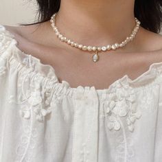 Sweet baroque pearl necklace At first sight, this baroque pearl choker can make people directly feel the meaning of sweet, delicate, and elegant. If you're looking for a real pearl necklace to go with your off-the-shoulder dress, square-neck tee, or anything without a collar, this is the right pearl necklace for women to wear. With a small but noticeable size, this 5-6mm baroque freshwater pearl necklace looks shiny and personal. The baroque pearl choker also comes with an eye-catching design: a Everyday Wear Jewelry, Natural Pearl Necklace, Moonstone Pendant Necklace, Real Pearl Necklace, White Pearl Necklace, Gemstone Beaded Necklace, Baroque Pearl Necklace, Freshwater Pearl Necklace, Chain Choker Necklace