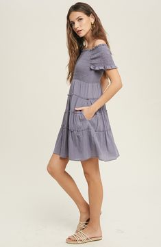 A smocked bodice adds on-trend appeal to an all-cotton minidress with a tiered silhouette that effortlessly sways with your every move. Slips on over head Square neck Short sleeves On-seam pockets 100% cotton Hand wash, dry flat Imported Casual Tiered Smocked Dress With Smocked Cuffs, Casual Tiered Dress With Smocked Cuffs, Cotton Smocked Mini Dress With Ruffles, Spring Cotton Smocked Mini Dress, Fitted Smocked Bodice Tiered Mini Dress, Flowy Smocked Mini Dress, Fitted Mini Length Tiered Dress With Smocked Bodice, Tiered Cotton Mini Dress With Smocked Back, Casual Smocked Tiered Skirt Dress