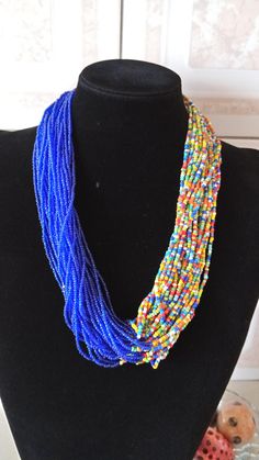 ON SALE African beaded multi-strand necklace Beaded Fringe | Etsy Multicolor Double Strand Beaded Necklaces As Gift, Multicolor Double Strand Beaded Necklace For Gifts, Blue Beaded Multi-strand Layered Necklace, Blue Multi-strand Beaded Layered Necklace, Multicolor Double Strand Beaded Necklace As Gift, Beaded Long Layered Necklace For Gifts, Layered Necklace With Colorful Round Beads For Gifts, Gift Layered Necklace With Colorful Round Beads, Multi-strand Beaded Necklace For Gifts