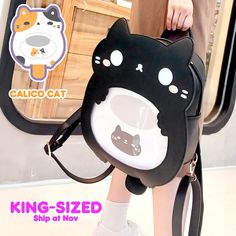 The Black Cat and Calico v1.0 cat ita bags are currently sold out. However, we are excited to announce that we have successfully funded the Kickstarter campaign for the Cat Ita Bag v1.35 and v1.5! v1.5 cat ita bag is 150% size of v1 cat ita bag. you can wear the ITA BAG v1.5 as a BACKPACK. Straps can be adjusted up to 110cm/63cm. Different between v1 and v1.5 -Added a handle on the top of the bag.  -Added strap for suitcase at the back. -Added a tail pocket. -Removed the back zip pocket and the Kawaii Backpack With Cat Design For Daily Use, Harajuku School Bag With Cat Design, Kawaii Cat Design Backpack For Everyday Use, Kawaii Student Bag With Cat Design, Kawaii Cat Design Bag For Students, Kawaii Shoulder Bag With Cat Design For Daily Use, Kawaii Cat Design Shoulder Bag For Daily Use, Kawaii Cat Design Bag For Everyday Use, Cute School Bags With Cat Print