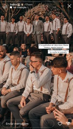 a group of men sitting next to each other