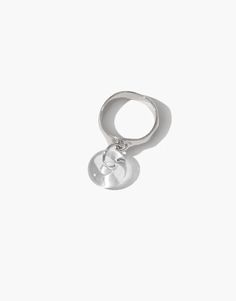 Elegant sterling silver ring with dangling circular eco charm