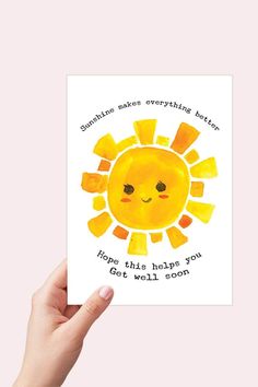 someone is holding up a card with an image of a sun in the middle and text that reads sometimes makes everything better