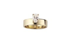 a yellow gold ring with a single diamond in the center and two smaller diamonds on each side