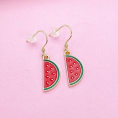 This is gold tone watermelon charm on stainless steel ear hook. ♥ You will receive 1 pair. HOW TO ORDER 1) Select the quantity 2) Select finish 3) Add to cart DESCRIPTION ♥ Real 18K Gold Plated 304 Stainless Steel Earrings, Size: about 0.67 inch(17mm) long, 0.71 inch(18mm) wide, 0.09 inch(2.4mm) thick ♥ Watermelon Charm, Alloy Enamel Pendants, Red, Size: about 0.39 inch(10mm) wide, 0.89 inch(22.5mm) long, 0.04 inch(1mm) thick ♥ Materials from the USA and international sourcing, Made and ship fro Gold Novelty Drop Earrings, Watermelon Colored Summer Jewelry Gift, Summer Watermelon Colored Jewelry For Gift, Red Dangle Jewelry With Fruit Design, Red Fruit Design Dangle Jewelry, Casual Red Metal Jewelry, Red Fruit Design Drop Earrings, Summer Casual Jewelry With Fruit Design, Casual Summer Jewelry With Fruit Design