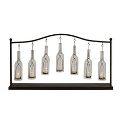 a light fixture with six glass bottles hanging from it's sides and four lights on each side