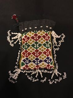 Vintage uzbek beads purse bag Home decorative ,nice beautiful bag Size : 15 cm x 13 cm FAST WORLDWIDE SHIPPING almost within 3 to 5 working days ... https://www.etsy.com/shop/akcaturkmen Thanks visiting for my shop :) Traditional Beaded Shoulder Bag As Gift, Traditional Beaded Rectangular Pouch, Traditional Beaded Bags For Festivals, Traditional Beaded Rectangular Shoulder Bag, Handmade Traditional Pouch For Festivals, Traditional Handmade Pouch For Festivals, Traditional Handwoven Pouch Shoulder Bag, Traditional Multicolor Beaded Bags, Handmade Bohemian Festival Pouch