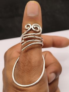 About item Item :- MCP Joint Ring Ring size :- Chose from variation (Custom size accepted) Material  :- 925 Sterling silver Purity  :- 92.5 Title:-Thumb Splint MCP 925 Silver Ring, MCP Hyperextension Splint, Arthritis Rings, MCP joint support Thumb Ring,Splint Finger For All Joints Ring, EDS Splint ring, Grandma Gift Description:- We use 925 sterling silver to making jewelry. We accept all types of custom & personalized order. Please send us a message if you are interested in a custom creation. Mcp Ring Splint, Adjustable Sterling Silver Ring With Unique Design, Adjustable Silver Spiritual Midi Rings, Adjustable Spiral Midi Rings In Silver, Adjustable Spiral Silver Midi Rings, Unique Silver Bypass Ring For Gift, Adjustable Silver Spiral Midi Rings, Silver Spiritual Open Midi Rings, Spiritual Silver Open Midi Rings