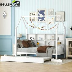 a bedroom with blue walls and white furniture