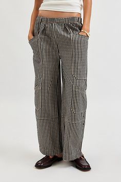 BDG pants crafted from a cotton canvas fabric with an allover gingham print. Cut in an easy fit with a low-rise and a loose wide-leg. Finished with oversized patch pockets at the sides. Only available at UO. Features BDG Charlie gingham wide-leg pant Cotton wide-leg pant Lightweight gingham print fabric Low-rise elasticated waistband Cargo-style front pockets Back buckle detail and welt pockets Low rise wide-leg fit Full length Easy pull-on style UO exclusive Content + Care 100% Cotton Machine w Wide-leg Plaid Bottoms With Pockets, Plaid Wide-leg Pants With Pockets, Cotton Gingham Pants For Fall, Gingham Cotton Pants For Fall, Fall Gingham Cotton Pants, Plaid Straight Leg Cotton Pants, Plaid Cotton Straight Leg Pants, Plaid Cotton Workwear Bottoms, Plaid Cotton Bottoms For Work