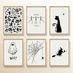 four black and white halloween wall art prints on the wall in various shapes, sizes and colors