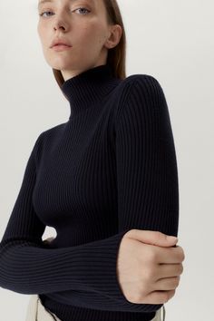 COMPOSITION: 100% Merino Wool FIT: Designed for a close fit Vovk is 1.73 m (5.67 ft) tall and wears size S DESIGNER NOTES: Roll-neck Gauge 14, 1ply Ribbed texture MATERIAL: 100% Merino Wool SIZE GUIDE (in cm): XSSMLXL(A) PIT TO PIT30 32 34 37 40 (B) SHOULDERS28 29 30 32 34 (C) COLLAR TO BOTTOM56 57 59 60 62 SIZE CONVERSION: Cashmere Poncho, Oxford Blue, Beautiful Lingerie, Roll Neck, Bra Lingerie, Online Womens Clothing, Vneck Sweater, Pajama Set, Merino Wool