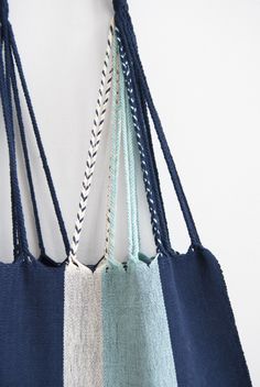 These versatile totes are handwoven by artisans in Chiapas, Mexico on a backstrap loom. Perfect for a beach day, the farmer's market, or as an everyday purse! Designed by and created exclusively for The Global Trunk. This bag is approx. 16" wide x 26" tall with the strap. Due to the handmade nature, height and width of bag can vary up to 10%. Blue Handwoven Summer Shoulder Bag, Summer Blue Handwoven Shoulder Bag, Blue Handwoven Crochet Bag For Market, Blue Woven Crochet Bag For Market, Summer Beach Bag With Weaving For Everyday Use, Eco-friendly Woven Beach Bag For Market, Blue Handwoven Shoulder Bag For Market, Beach Tote Shoulder Bag With Weaving Work, Eco-friendly Handwoven Blue Beach Bag