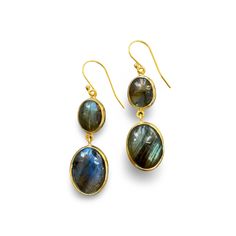 These stunning two-drop earrings feature natural labradorite stones, each with unique variations that make every pair one-of-a-kind. The handmade bezel setting enhances the natural beauty of the stones, which catch the light with subtle flashes of blue and green. With neutral hues, these earrings easily complement any outfit. The French hook design ensures a comfortable fit, and the 1.5" length adds a touch of understated sophistication. Labradorite Earrings, Hook Design, Labradorite Stone, The Natural, Bezel Setting, Blue And Green, The Light, Labradorite, Natural Beauty