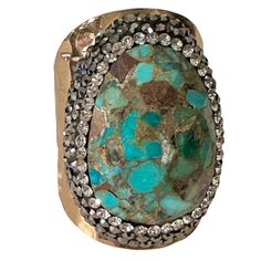 This beautiful ring will definitely be a statement piece to talk about! It is adjustable so you can size it to your liking. Gold Line Stone Authentic Open Cuff Ring Rhinestones Hammered gold band Open back Adjustable 18k electroform Luxury Unique Turquoise Ring With Large Stone, Luxury Bohemian Kingman Turquoise Ring, Luxury Southwestern Turquoise Ring With Patina, Luxury Unique Adjustable Turquoise Ring, Luxury Adjustable Unique Turquoise Ring, Luxury Bohemian Rings With Patina, Luxury Bohemian Turquoise Ring With Patina, Luxury Large Stone Turquoise Bohemian Ring, Luxury Adjustable Bohemian Turquoise Ring