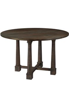 an oval wooden table with two pillars on each end and one leg in the middle