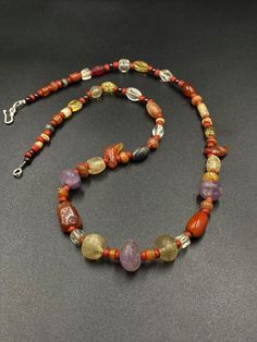 The combination of ancient agate, crystals and glass beads necklace . good condition .its found mostly in central Asia some red color ancient glass beads are used as spacers we provide fast and free shipping service world wide Red Gemstone Beaded Necklaces For Spiritual Purposes, Artisan Red Beads For Healing, Artisan Red Beads With Natural Stones, Red Artisan Beads With Natural Stones, Artisan Red Agate Beads, Artisan Red Natural Stone Beads, Red Crystal Necklace With Natural Stones For Healing, Red Spiritual Crystal Necklace With Natural Stones, Red Polished Beads For Spiritual Jewelry