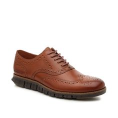 Cole Haan-ZeroGrand Wingtip Oxford The ZeroGrand wingtip oxford from Cole Haan flaunts the perfect balance of tailored and casual style. Featuring a sporty EVA midsole with Grand.øs technology, this lace-up can be dressed up or down for any outfit. Brown Wingtip Lace-up Oxford Shoes, Formal Wingtip Sneakers With Cushioned Footbed, Casual Oxford Wingtip Lace-up Shoes, Casual Wingtip Oxford Lace-up Shoes, Casual Oxford-style Lace-up Wingtip Shoes, Casual Wingtip Oxfords With Leather Sole, Wingtip Oxford Lace-up Shoes With Textured Sole, Casual Wingtip Oxford Shoes, Casual Wingtip Oxfords In Oxford Material