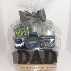 a father's day gift basket with the word dad on it