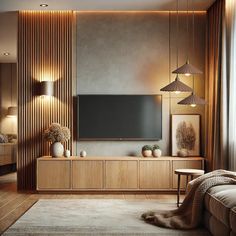 a living room with a large flat screen tv on top of a wooden entertainment center