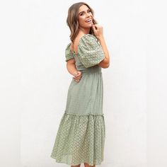 Step Outside In Style With Vera. This Charming Dress Is Designed With A Flattering Silhouette, Flirty Puff Sleeves, Smocked Bodice, And Eyelet Details. Style Info & Care Nursing Friendly Smocked Bodice Puff Eyelet Sleeves Square Neckline Ruffled & Eyelet Hemline Solid Woven Texture Lined Self: 97% Polyester 3% Spandex, Contrast: 100% Cotton, Lining: 100% Polyester Approx. Length: 40.5” Hand Wash With Cold Water, Do Not Bleach, Line Dry, Iron Low Model Info Model Is 5'5” And Is Wearing Size Small Spring Puff Sleeve Non-stretch Dress, Spring Non-stretch Dresses With Puff Sleeves, Spring Maxi Dress With Smocked Bodice And Square Neck, Spring Square Neck Smocked Dress For Garden Party, Spring Smocked Square Neck Dress For Garden Party, Summer Puff Sleeve Maxi Dress With Smocked Bodice, Spring Square Neck Smocked Dress With Smocked Back, Square Neck Smocked Dress For Beach In Spring, Spring Midi Smocked Dress With Ruffle Hem