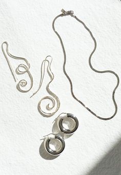 Essentialist Earring from Shannon Bond. Sterling silver hoop with hinge closure. Lightweight for everyday wear. Sold as pair. Need a second opinion? If you have special requests or just need advice, please reach out to hello@shop-vestige.com. Sterling silver. Made in Italy Silver Spiral Fine Jewelry, Minimalist Small Hoop Jewelry With Sterling Silver Clasp, Contemporary Sterling Silver Hoop Jewelry, Modern Small Hoop Jewelry With Sterling Silver Clasp, Sterling Silver Clasp Small Hoop Jewelry For Everyday, Minimalist Sterling Silver Clasp Earrings, Contemporary Pierced Hoop Jewelry, Minimalist Spiral Sterling Silver Hoop Earrings, Minimalist Spiral Hoop Earrings In Sterling Silver