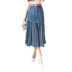 Pleated women's denim skirt online—excellent jeans skirt from the 2022 Spring-Summer collection. The fashionable outfit helps to look modern and draws the attention of others. Bright yet understated enough to not seem OTT, this blue denim catches the eye at first glance. This medium wash design highlights simple fading to give the denim an open, broken-in appearance. Depending on your mood, the pleated model can be dressed down with flats and a biker blazer or dressed up with fabulous heels and Plated Skirt, Denim Skirts Online, Pleated Denim Skirt, Skirt Patterns, Womens Denim Skirts, Long Denim Skirt, Jeans Skirt, Denim Skirt Women, Denim Fabric