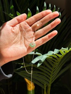 Crafted with a cloud-shaped nephrite jade pendant, this necklace is sure to make a statement. The exquisite detailing and high-quality design make it a distinctive piece you'll treasure for years. Weight: 2g Adjustable chain: gold-plated S925 sterling silver, length 400-430mm Pendant: nephrite, width 15mm x length 12mm x thickness 5mm Elegant Jade Necklace With Adjustable Chain, Jade Pendant Necklace, Cloud Shapes, Nephrite Jade, Chain Gold, Green Necklace, Jade Pendant, Green Jade, Jade Green