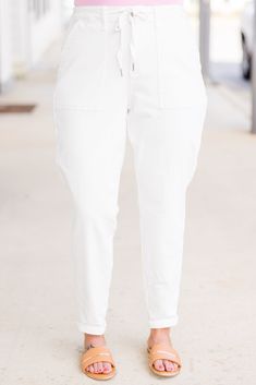 Introducing Judy Blue's White Out joggers, the perfect addition to your summer wardrobe! These high-rise cuffed denim joggers feature a zip fly and button closure, along with an adjustable drawstring detail at the waist for added comfort and style! Say goodbye to boring outfits and hello to effortless, trendy looks with these joggers! 93% Cotton, 6% Polyester, 1% Spandex Cotton Joggers For Everyday Spring Wear, Casual Pull-on Joggers For Spring, Spring Casual Elevated Joggers, Spring Joggers With Elastic Waistband For Elevated Casual Wear, Sporty Spring Joggers For Elevated Casual Wear, Casual Jeans With Elastic Waistband For Day Out, Everyday Spring Straight Leg Joggers, Spring Cotton Sweatpants For Day Out, Trendy Spring Everyday Joggers