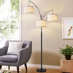 a living room scene with focus on the floor lamp